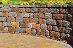 Installing retaining walls require specialized landscaping skills