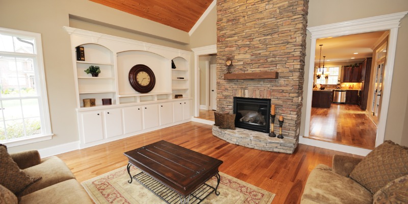 gas fireplace on brick wall in living room