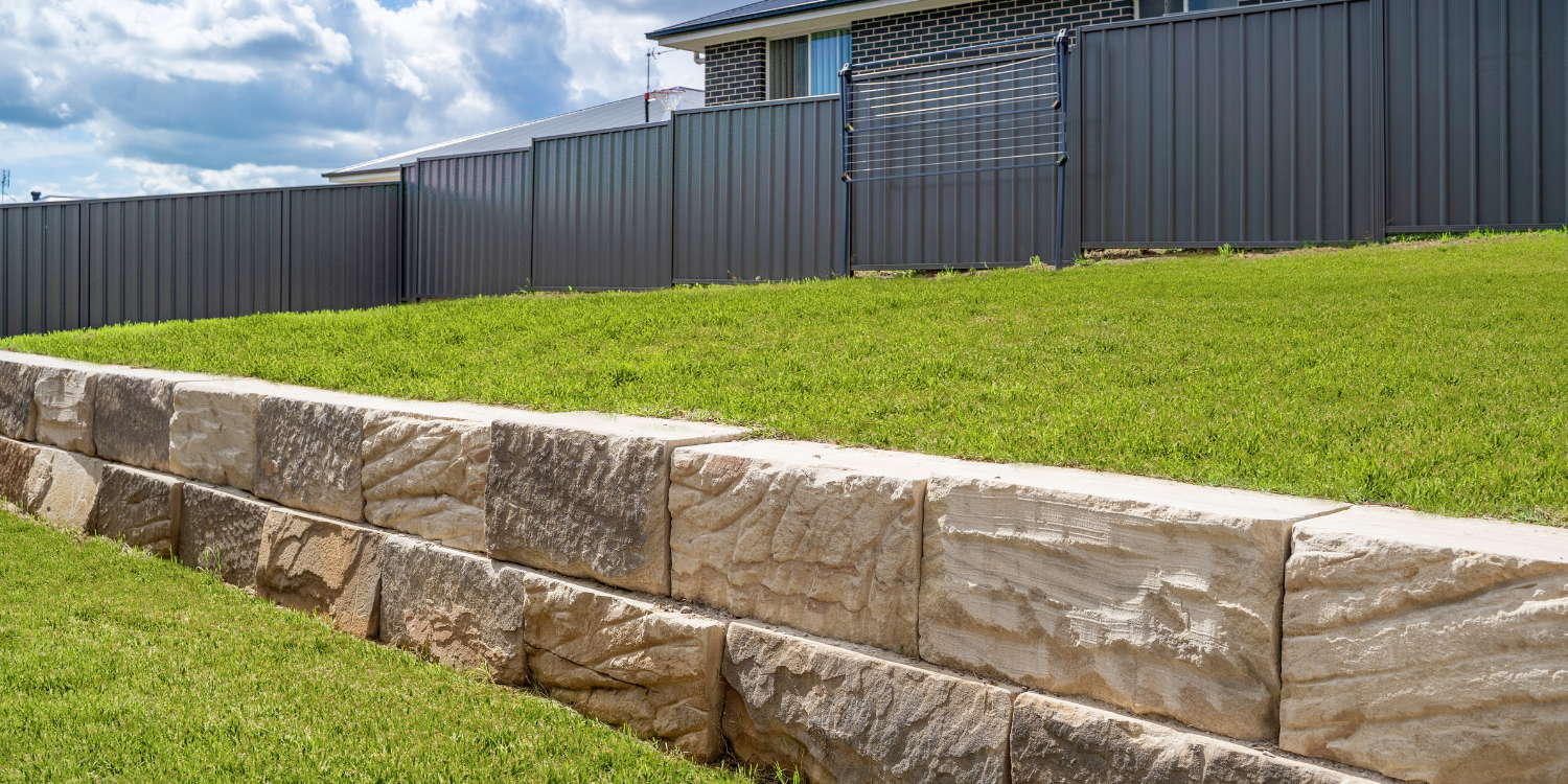Armour Stone Retaining Wall - 7 Retaining Wall Styles to Consider for Your Outdoor Spaces